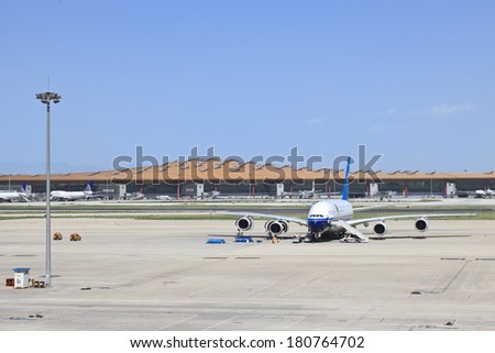 BEIJING - MAY 11, 2013. China Southern Airbus A380 parked at Beijing Capital Airport. Double-deck, wide-body, four-engine jet airliner, world\'s largest passenger airliner designed to challenge Boeing.