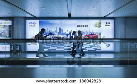 BEIJING-OCT. 4, 2014. VW advertisement Beijing Capital Airport. VW said it planned develop and build new, environmentally-friendly vehicle with FAW, after recent talks between Merkel and Xi Jinping.