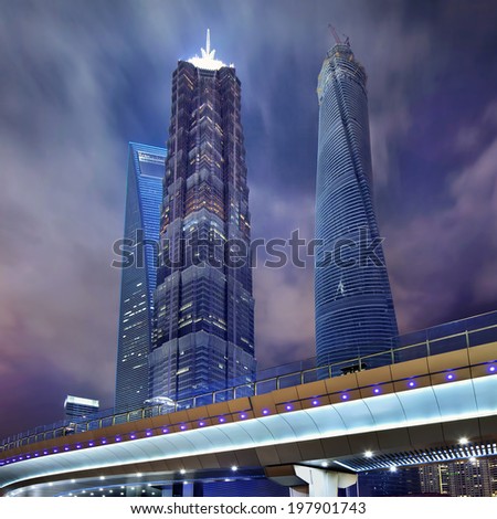 SHANGHAI-JUNE 4, 2014. Jin Mao, Shanghai Tower and Shanghai World Financial Center at Lujiazui. Lujiazui is a national-level development finance and trade zone designated by the Chinese government.