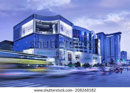 KUNMING-JULY 3, 2014. Parkson shopping mall with media screens. Outdoor media is second most popular advertising medium in China, its growth rate is higher than for TV, newspapers and magazines.