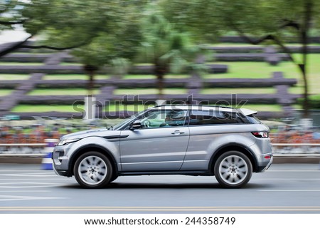 WENZHOU-CHINA-NOV. 19, 2014. Range Rover Evoque SUV downtown. Land Rover plans to complain to Chinese officials about (Landwind) copy of its Evoque SUV that recently appeared at Guangzhou Motor Show.