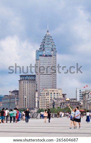 SHANGHAI-JUNE 6, 2014. Bund Boulevard with art-deco architecture. Ornate Western buildings are a legacy of Shanghai\'s colonial past, it was carved into zones under foreign influence in 19th century.