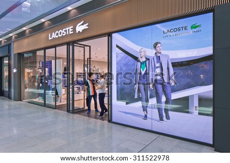 BEIJING-AUG. 21, 2015. Lacoste outlet. Lacoste is a French clothing company founded in 1933, it sells high-end clothing, footwear, perfume, leather goods, watches, eye wear, and famous polo shirts.