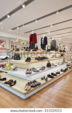 BEIJING-AUGUST 21, 2015. Hotwind outlet interior. It is a well-known fast-growing retail brand with more than 90 chain stores in Chinese cities and 1500 people to operate various types of footwear.