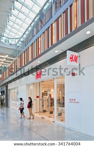 BEIJING-AUGUST 21, 2015. H&M outlet Livat shopping mall. Retailer H&M makes a big push into China. The world\'s second-largest clothing store has plans to open most of its upcoming 240 stores in China.