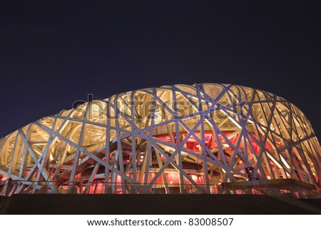BEIJING - AUGUST 16: Bird\'s nest stadium at night time on August 16, 2011 in Beijing, China. It was designed for 2008 Summer Olympics and Paralympics.