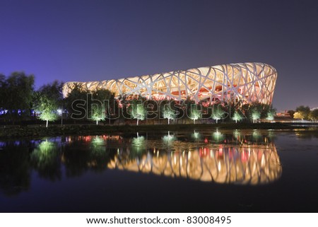 BEIJING - AUGUST 16: Bird\'s nest stadium at night time on August 16, 2011 in Beijing, China. It was designed for 2008 Summer Olympics and Paralympics.