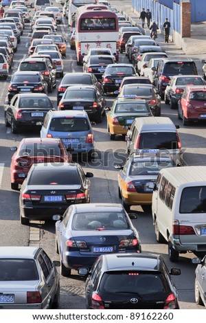 BEIJING - NOV. 19. Traffic jam in Beijing Central Business District. Recently the number of cars in Beijing hit 4 million and its car fleet grows at 1,900 cars daily. Beijing, Nov. 19, 2011.
