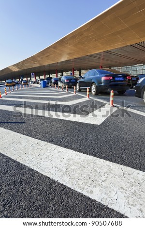 BEIJING - DEC 12: Waiting cars at Terminal 3 of Beijing Capital Airport on Dec 12, 2011.  The airport has registered 488,495 aircraft movements (take-offs and landings).