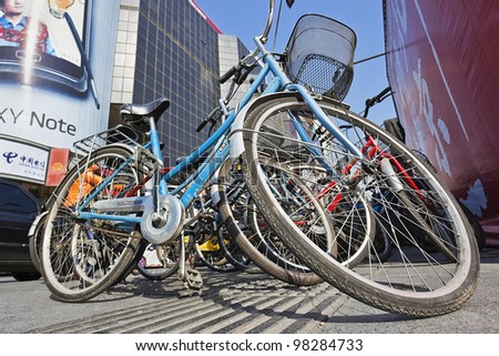 BEIJING - MARCH 12, 2012. Parked bicycle in Beijing on March 12, 2012. China produces 90 million bicycles annually and export two-third. About 9 in 10 bikes bought by Americans are made in China.