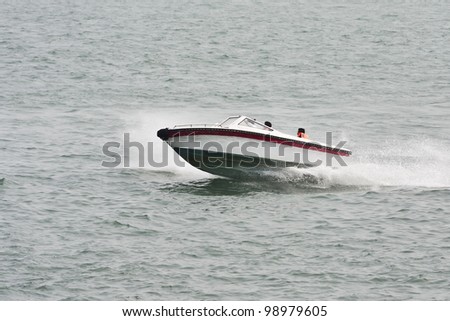 XIAMEN-CHINA-MARCH 22, 2009. Speed boat on March 22, 2009 in Xiamen. The fastest crossing from Xiamen to its famous Gulangyu (Piano Island) is by speed boat. I take 3 minutes and costs 50 Yuan.