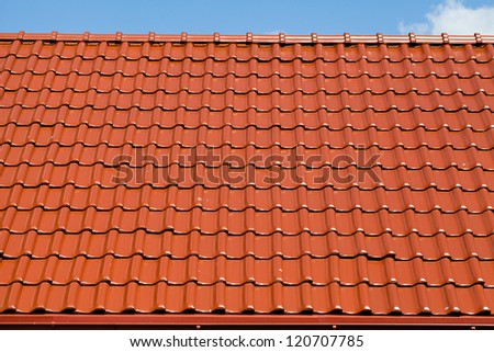 red roof with blue sky