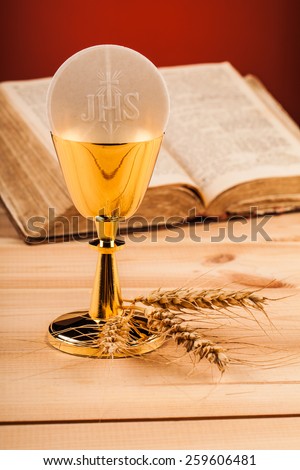 Christian holy communion composition on wooden table