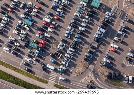 aerial view over crowded  parking lot near supermarket in Poland