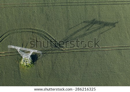 Aerial view of electrical wires large scale power energy tower in Poland