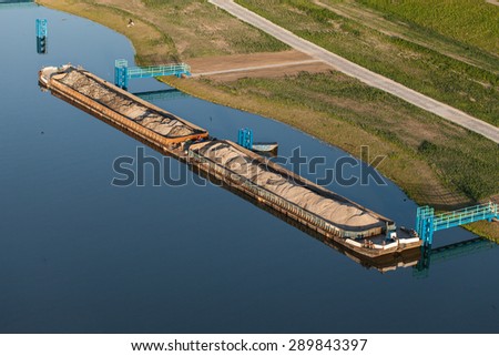 aerial view of a river barge on Odra river in Poland