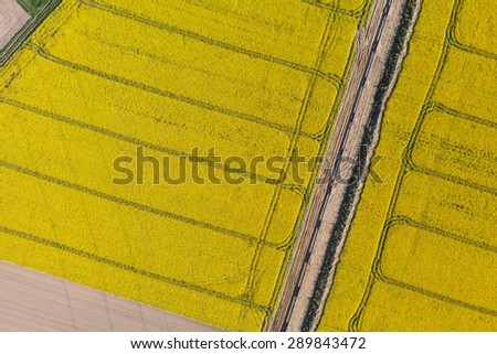 aerial view of burying gas pipe in a country harvest fields  area  in Poland