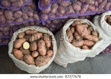 Fresh potatoes in a bags at the market