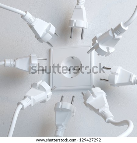 Many Electric Plugs are Fighting for Power from the Wall Socket Many Electric Plugs are Fighting for Power from the Wall Socket