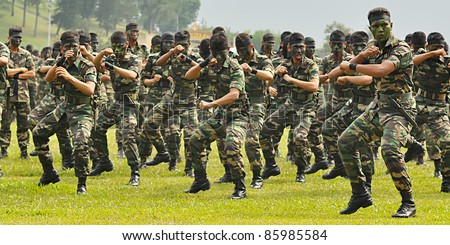 KUALA LUMPUR, MALAYSIA - SEPT. 30: Battalion Jebat group performs war dance at National Defense University Of Malaysia, Kuala Lumpur, Malaysia on September 30, 2011.