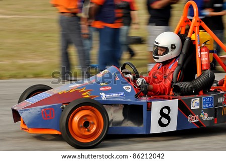 KUALA LUMPUR - JULY 1: Unidentified  driver in a racing car model competes at Educational Innovation of Motor sports & Automotive Race 2011 in Kuala Lumpur, Malaysia on July 1, 2011.