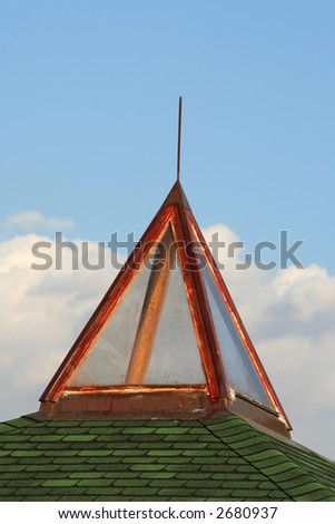 Glass pyramid on green roof
