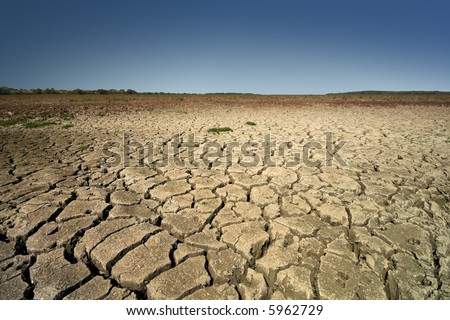 Scorched earth with blue sky