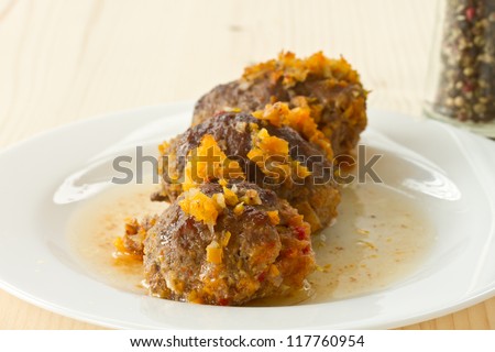 meat quenelles with vegetables also add on a plate