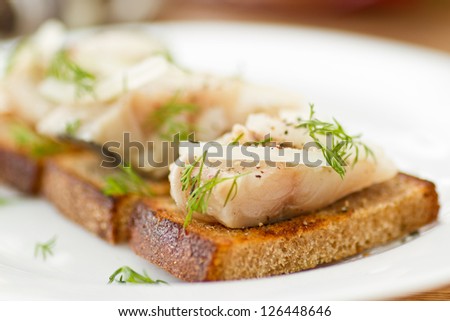 salted mackerel with grilled toast and condiments