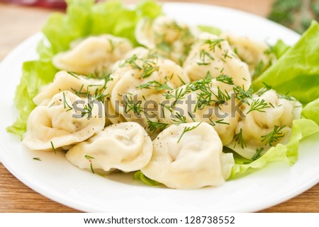 delicious dumplings boiled in fresh lettuce leaves