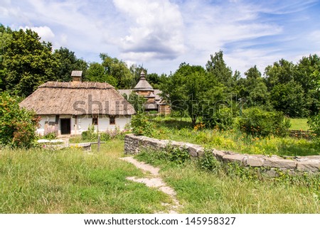 old house in the village in summer