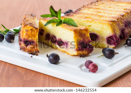 Cottage cheese pie with berries decorated with mint
