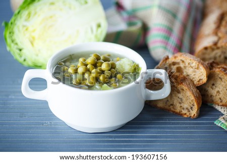 pea soup with cabbage and vegetables on the table