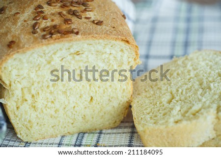 fresh homemade corn bread with seeds on a  table