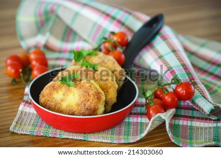 fried fish cutlets in the corn flour on the table