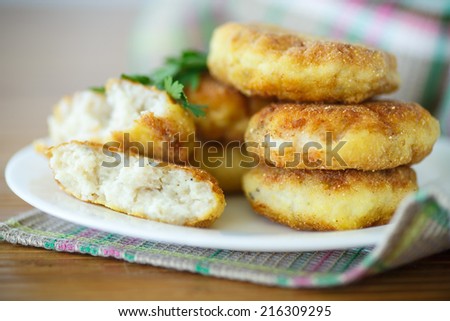 fried fish cutlets in the corn flour on the table
