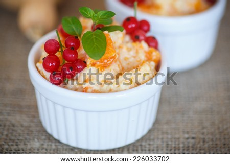sweet pumpkin porridge with berries and millet