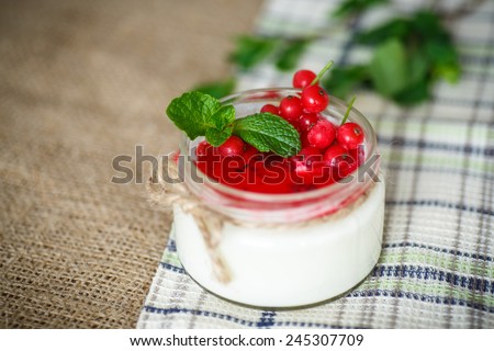 sweet homemade yogurt with jam and red currant
