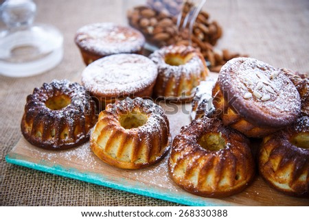 sweet cottage cheese walnut muffins in powdered sugar