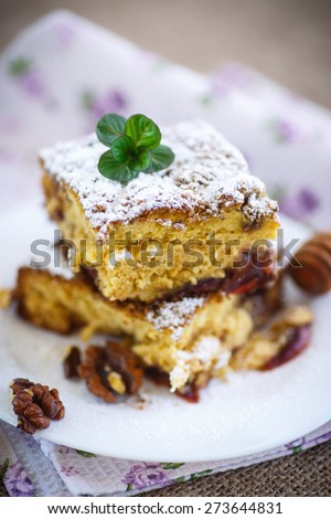 sweet honey cake with nuts and plums