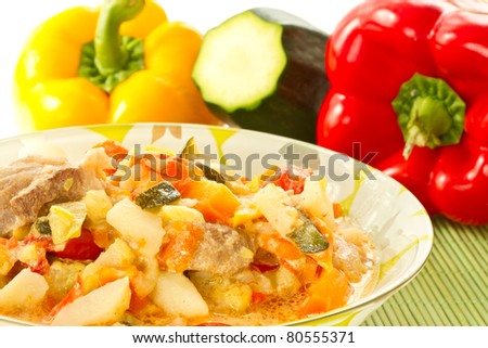 various stewed vegetables in a plate of vegetables on the background