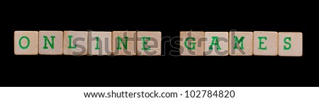 Green letters on old wooden blocks (online games)