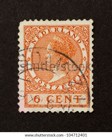 HOLLAND - CIRCA 1950: Stamp printed in the Netherlands shows the head of state (queen), circa 1950