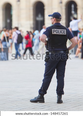 Paris, France - July 28 : French Police Control The Street At The Louvre During One Of The Busiest Days Of The Year, Paris The 28 Of July 2013, France