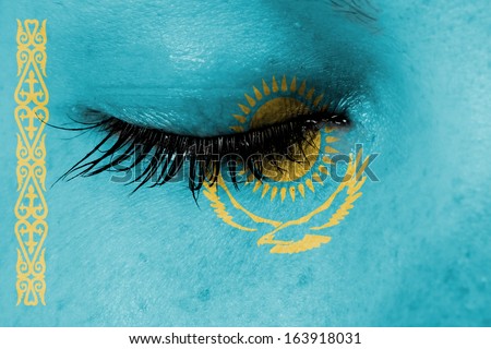Crying woman, pain and grief concept, flag of Kazakhstan