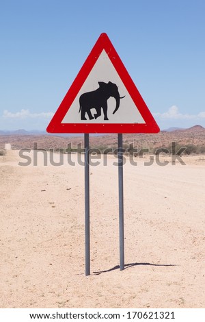 Caution: Elephants! Road sign standing beside road, Namibia, Africa