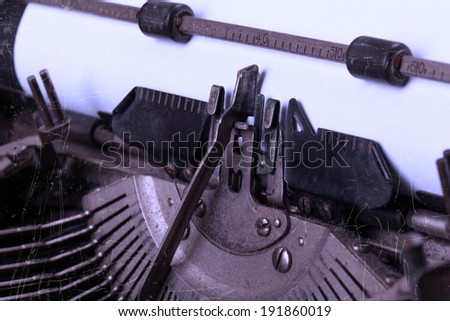 Close-up of an old typewriter with paper, vintage look