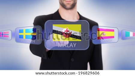Hand pushing on a touch screen interface, choosing language or country, Brunei