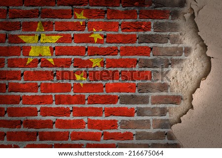 Dark brick wall texture with plaster - flag painted on wall - China