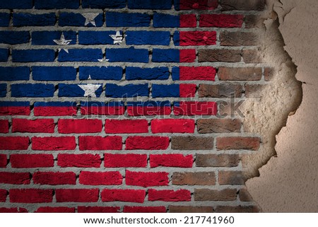 Dark brick wall texture with plaster - flag painted on wall - Samoa